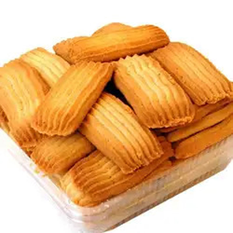 Keshar Atta Cookies: Golden brown cookies with saffron infusion, arranged on a plate, ready to delight your taste buds.