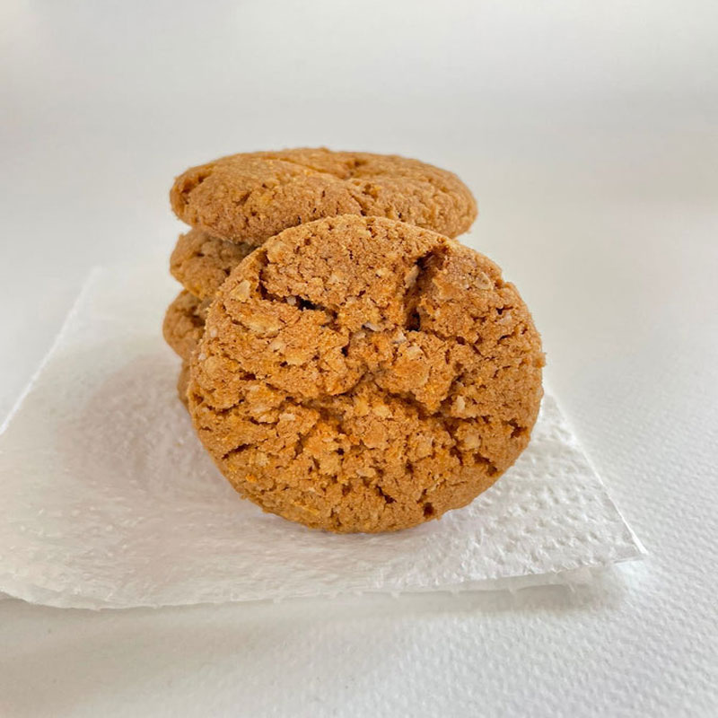 Close-up of golden-brown, butter cookies with a delicate crumb texture.