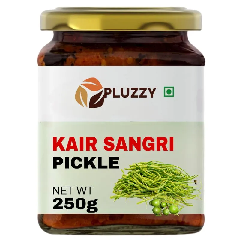 A jar of Handmade Kair Sangri Pickle, sangri imageshowcasing the vibrant green hues of raw mangoes and desert beans, infused with aromatic spices.
