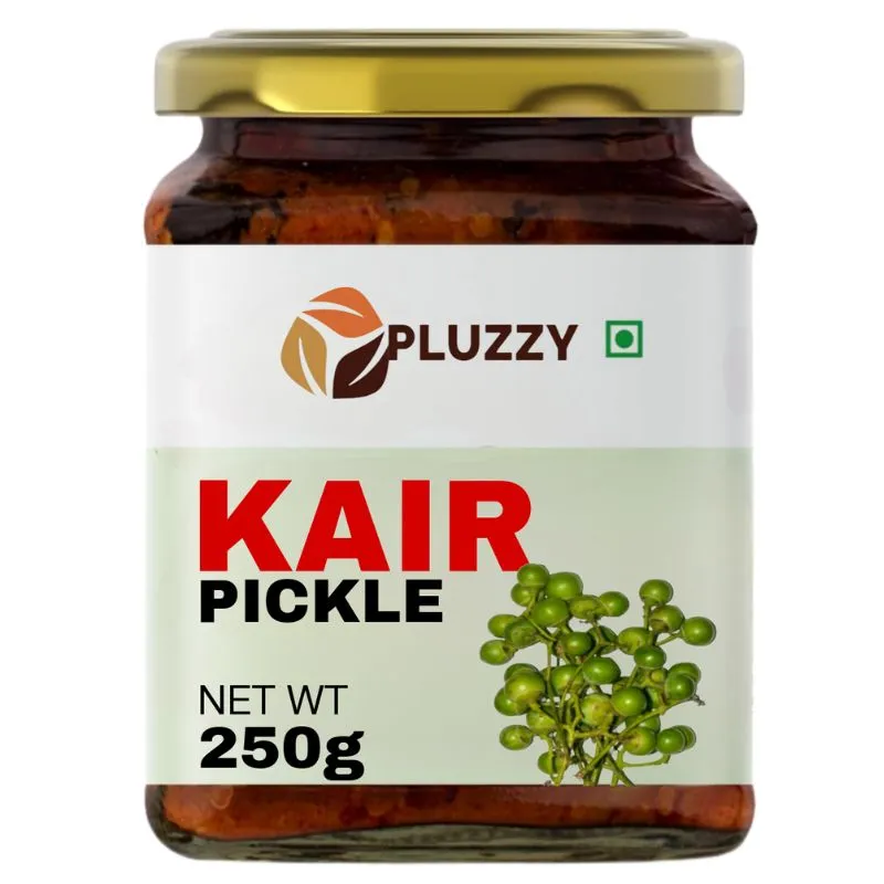 A jar of kair pickle, a traditional Indian condiment made from raw green mangoes and spices.