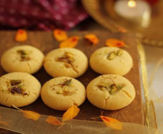 Golden NanKhatai Elaichi Cookies, a fragrant and buttery delight with a hint of aromatic cardamom.